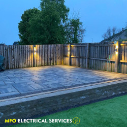 patio fence with lamps on them