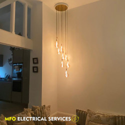 lighting multiple lightbulbs hanging from ceiling