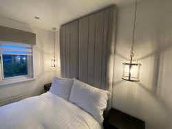 lighting lamps beside bed