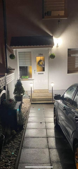 lamps at door at house